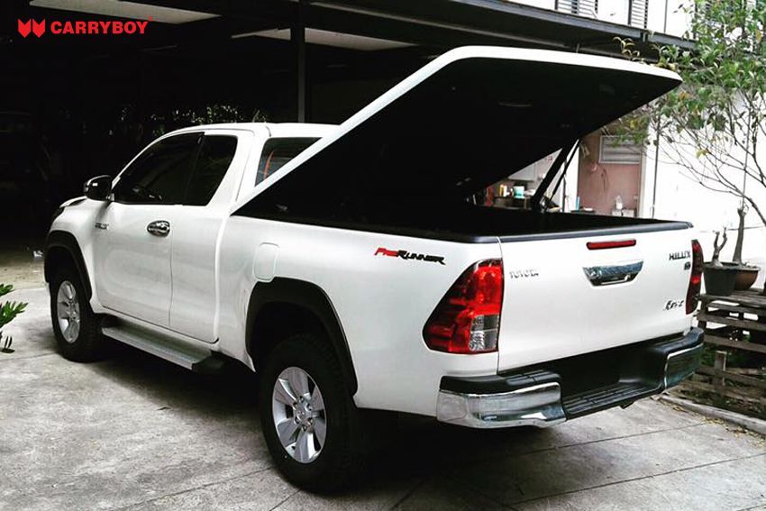 CARRYBOY Deckel in Wagenfarbe mit automatischem Motorhub Toyota Hilux Revo Invincible Extrakabine offen fahrbar