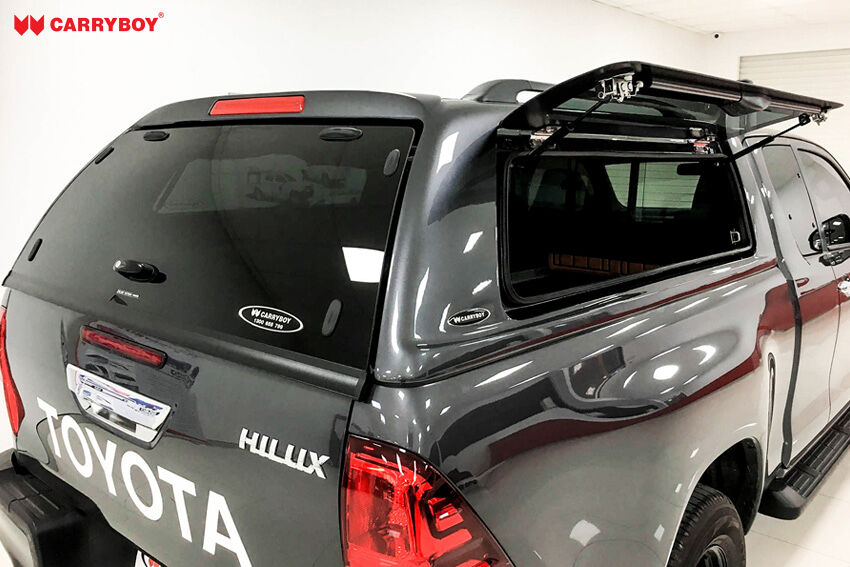 Toyota Hilux Revo Invincible Extrakabine Hardtop mit Klappfenster CARRYBOY