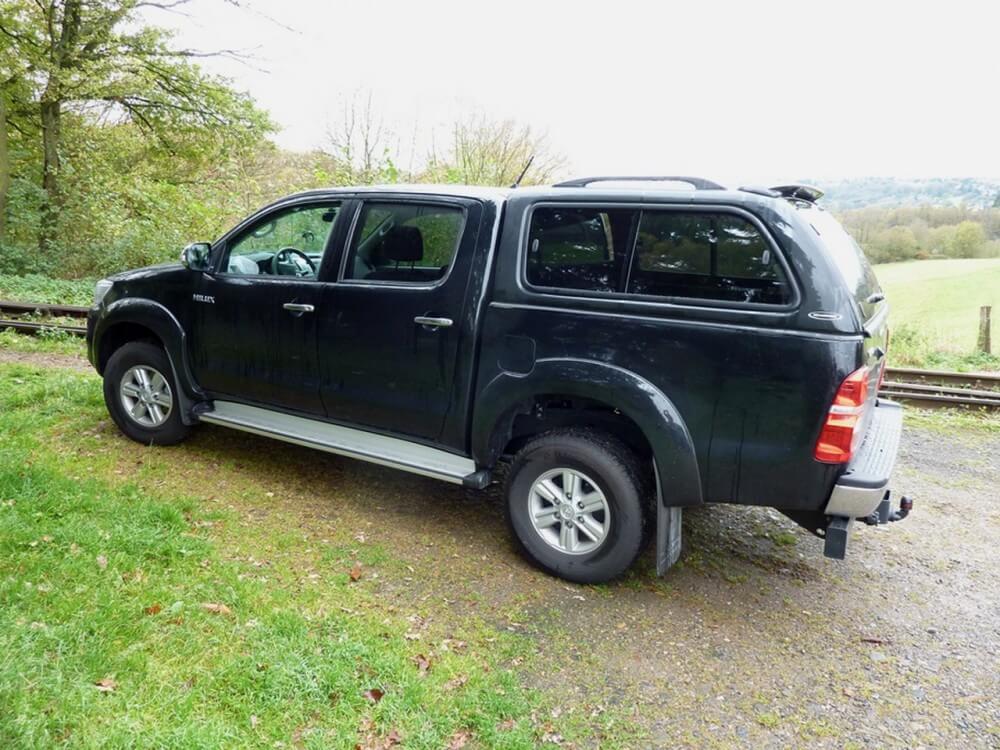 CARRYBOY Hardtop 560 mit seitlichen Schiebefenster für Toyota Hilux Vigo Doppelkabine Lackierung in Wagenfarbe